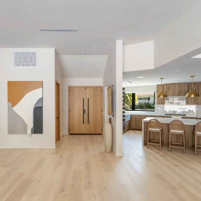 Modern kitchen with wooden floor and open-plan design