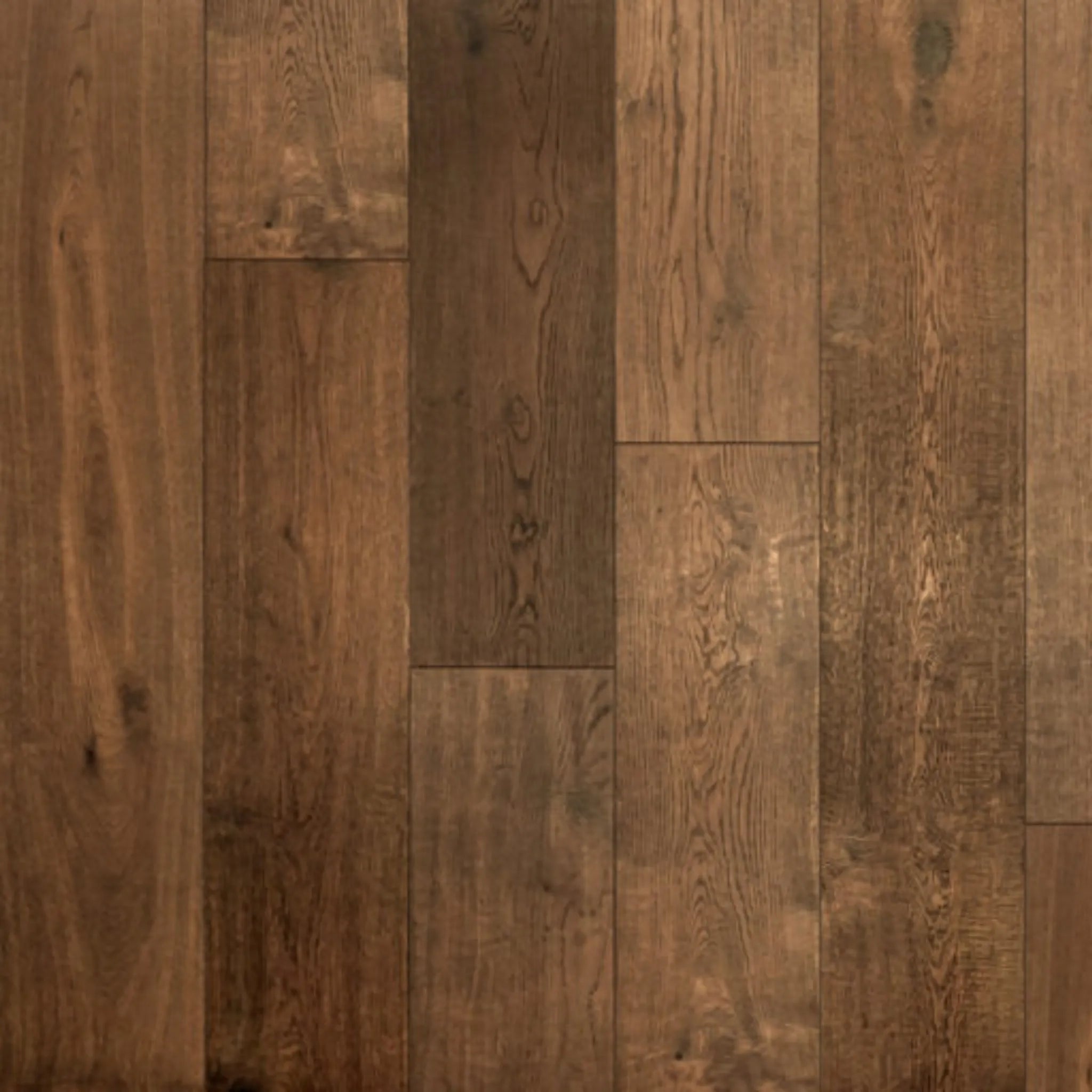 Close-up of wooden flooring with a warm brown color.